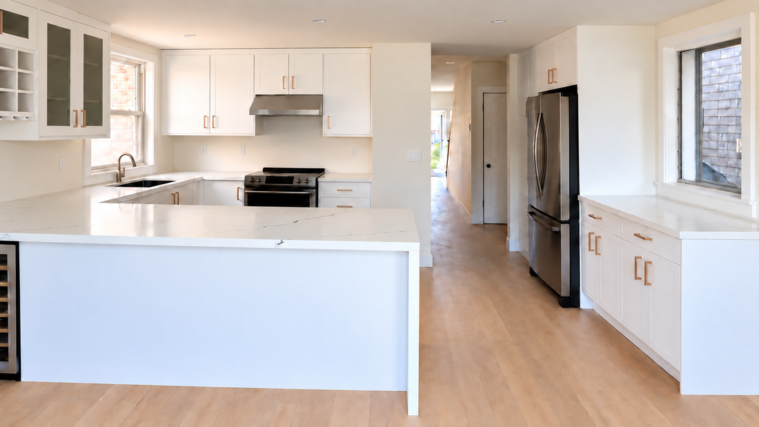 Custom-designed white kitchen with quartz countertops in Barrie